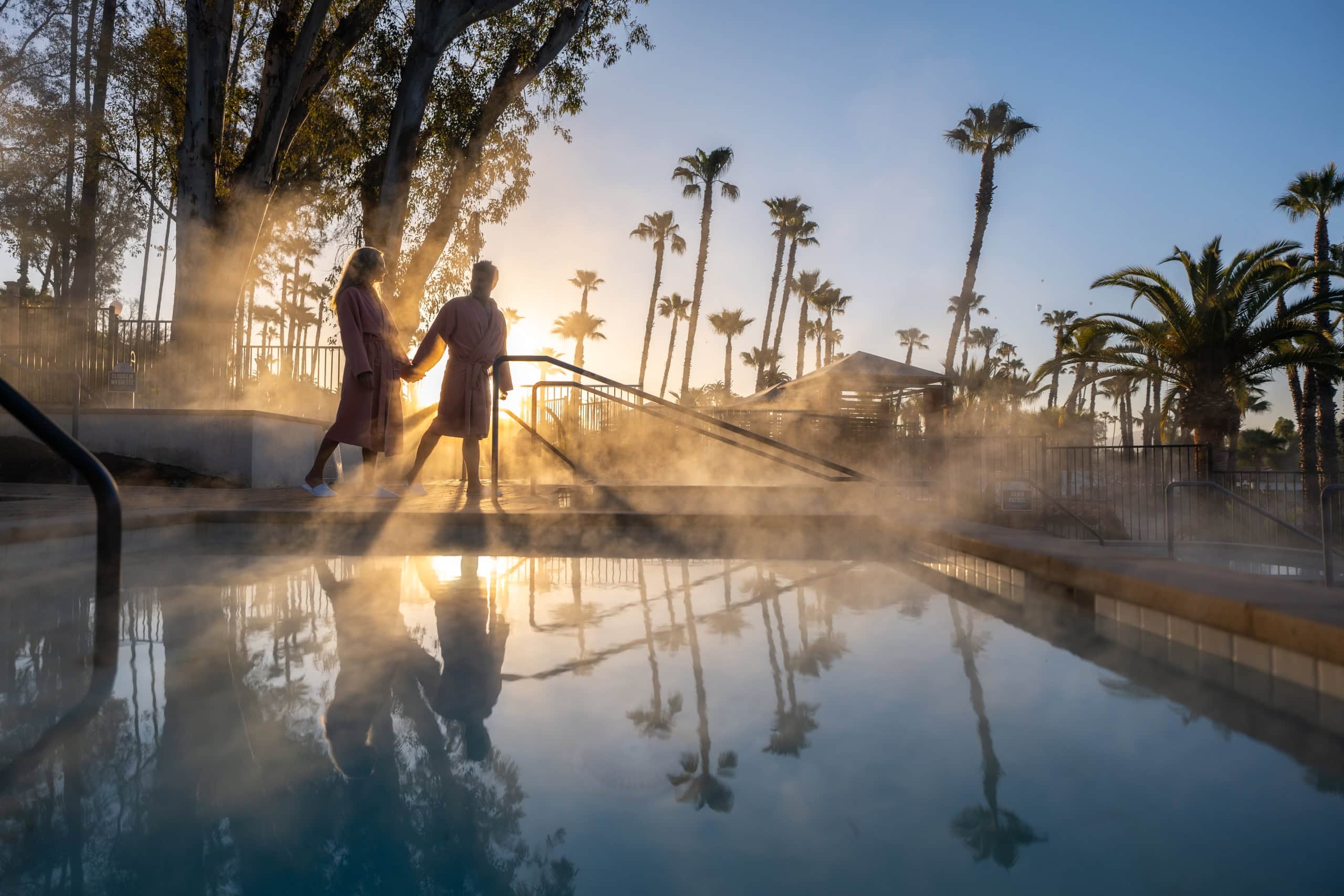 couple by Geothermal pool at Murrieta Springs