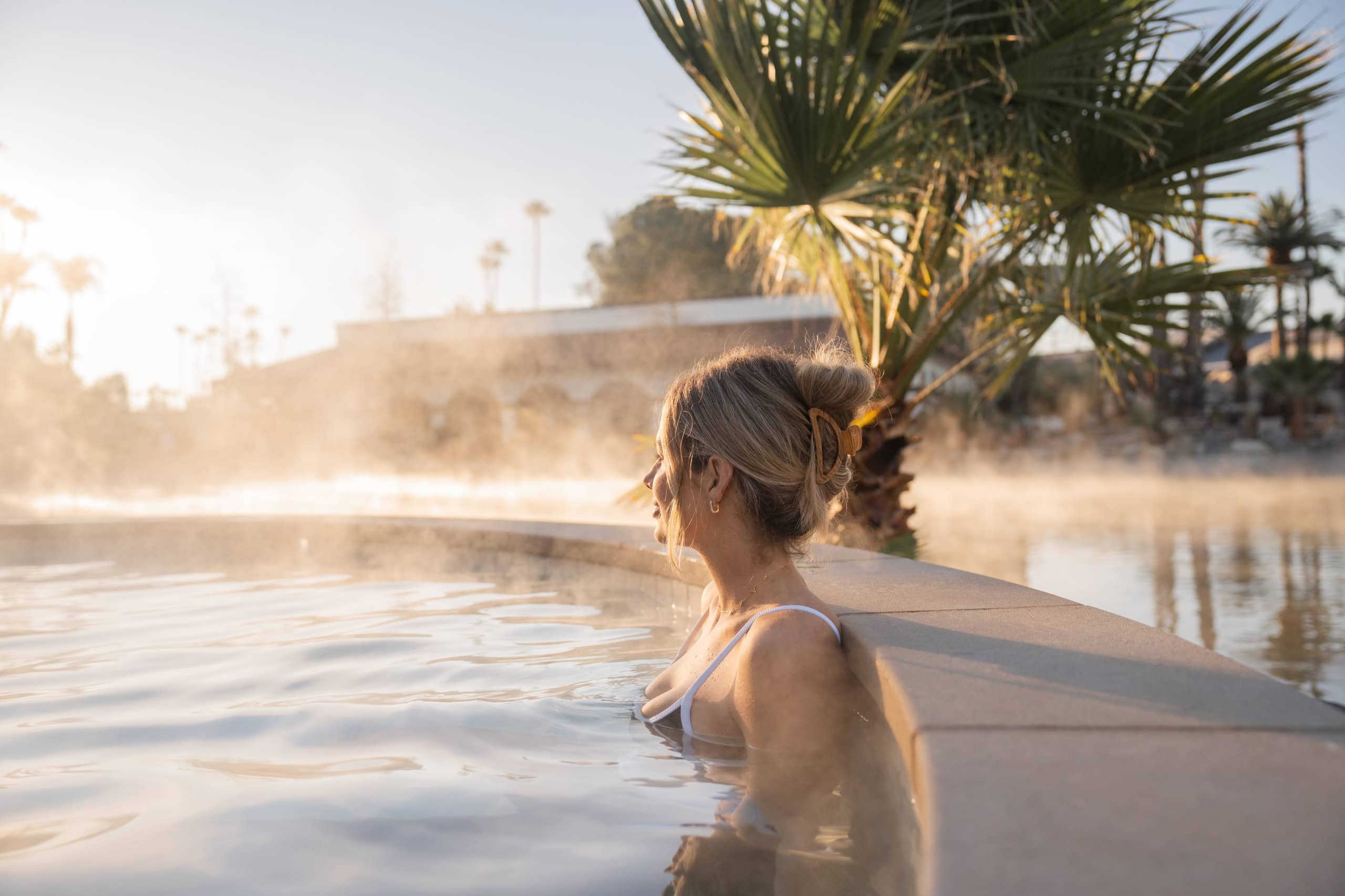 Relaxing woman in hot spring at Murrieta Hot Springs Resort