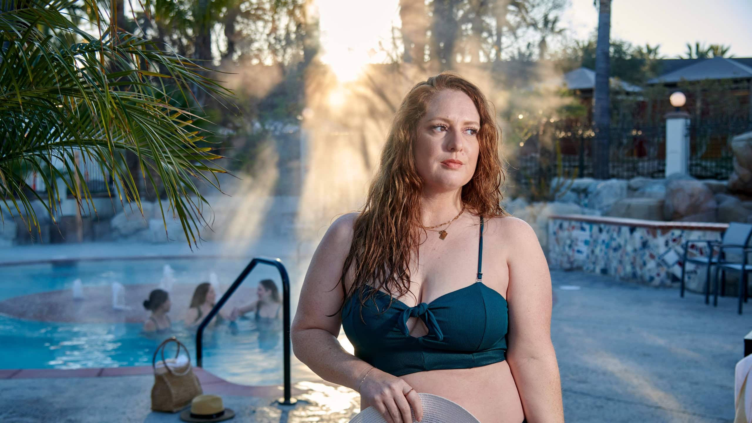 Beautiful woman enjoying hot springs at Murrieta Hot Springs Resort, California.