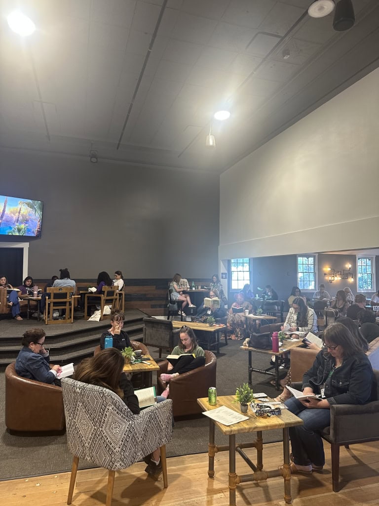 Cozy lounge at Murrieta Hot Springs Resort with guests relaxing and socializing.
